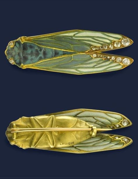 An Art Nouveau brooch in the form of a cicada, by René Lalique, 1900-05. The body of Pâte de Verre, with diamond set eyes, the plique-à-jour wings with diamond highlights to the tips, set in gold with realistically formed body to the reverse, signed Lalique. 5.1cm long. Rectangular cream box signed R.Lalique 40, Cours-La-Reine, Paris. #Lalique #ArtNouveau #brooch Cicada Brooch, Cicada Art, Lalique Jewelry, Bijoux Art Nouveau, Rene Lalique, Nouveau Jewelry, 5 De Mayo, Gathering Place, Insect Jewelry