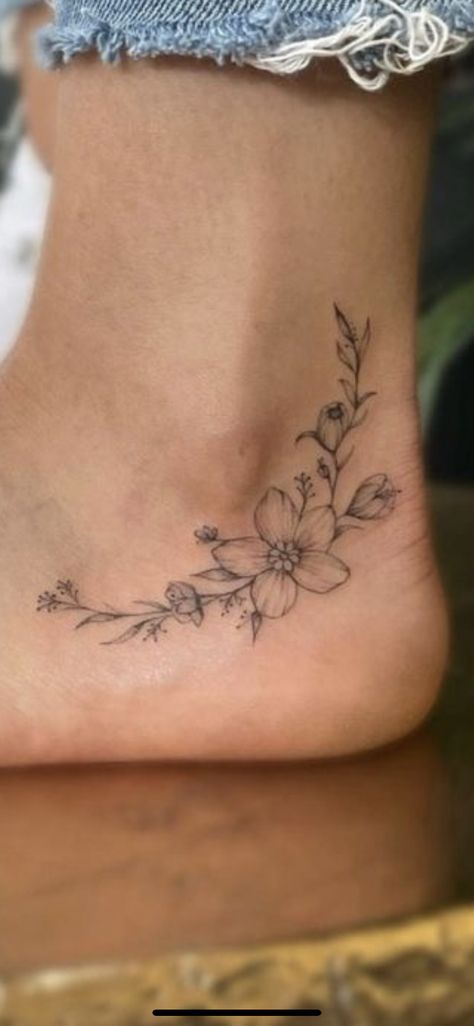 Under Ankle Tattoo, Small Tattoos And Placement, Wildflower Tattoo On Ankle, Daisy And Vine Tattoo, Small Floral Vine Tattoo, Carnation Ankle Tattoo, Mother Flower Tattoo, Beach Flower Tattoo Ideas, Flower Tatoos Woman Arm