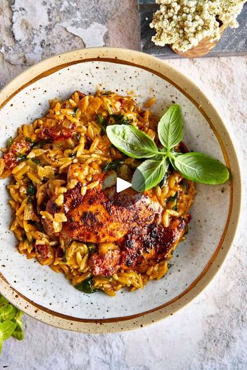 One Pot Chicken and Orzo | One Pot Chicken and Orzo | By Food Dolls | You know we're the queens of
one pot meals. And this one pot chicken and orzo pasta is here
to stay. You're going to season your chicken on both sides and
then you're going to sear it. Remove it from the pan and
leave all the flavor bits at the bottom. And then you're
going to add some onion, garlic, orzo, and saute that
just for a few and then add some broth, cream, sun-dried
tomatoes, Parmesan cheese, and then add some fresh spinach.
And then you're going to add your chicken back in and the
queen's did it again. Yes, you guys are going to love this
one. It's perfect for any weeknight meal. Yes. One Pot Chicken And Orzo Food Dolls, One Pot Chicken And Orzo, Chicken Orzo Pasta, Garlic Orzo, Chicken Bakes, Chicken And Orzo, Creamy Orzo, Orzo Recipe, Mediterranean Diet Recipes Dinners