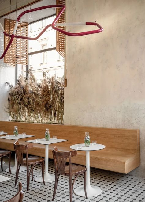 TERRAFINA · A collection curated by alessio bruni · Divisare Cafe Bench, Leather Bench Seat, Growing Wheat, Bakery Interior, Bentwood Chairs, Encaustic Tile, Wheat Fields, Flower Display, Metal Lamp