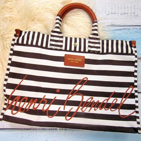 Striped style  Henri Bendel signature tote retails $88 OUR PRICE $36! .  .  It's beginning to look a lot like Christmas in July!  July 28-29 take 25% off storewide and 50% off clearance!  'Tis the season to save big!  .  .  Gotta have it? We do phone orders! Call: 610-455-1500 or  Shop: 1369 Wilmington Pike Hours: Mon- Sat: 10-8 Sun: 12-6  We ship and deliver free to our sister stores: Springfield & East Norriton. We Ship to Your Home!  #smallbiz #shopsmall Mom Bags, West Chester, Baby On The Way, Henri Bendel, Christmas In July, Large Tote, Chester, Weekender Bag, Diaper Bag