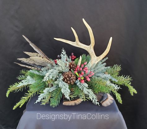 Flower Arrangements With Antlers, Antler Centerpiece Christmas, Antler Floral Arrangement, Wild Game Dinner Decorations, Antler Arrangements, Antler Table Decor, Antler Christmas Decor, Antler Centerpiece, Rustic Flower Arrangements