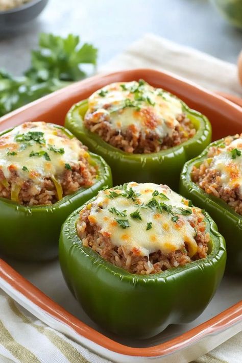 Stuffed Green Peppers: A Flavor-Packed Family Favorite Green Peppers, Beef And Rice, Melty Cheese, Aromatic Herbs, Sunday Dinner, Bell Peppers, Stuffed Green Peppers, Family Favorites, Fresh Herbs