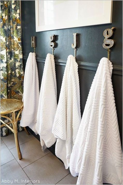 HANG DEDICATED TOWEL HOOKS – You'll never hear your kids fight over which towel is theirs again when you use hooks with their initials. This will ensure bathroom linens stay organized and (the best part) are dry when you go to grab 'em. Click through for the entire gallery and for more bathroom organizers. Beautiful Organization, Bathroom Organization Hacks, Bad Inspiration, Boys Bathroom, Upstairs Bathrooms, Girls Bathroom, Bathroom Redo, Family Bathroom, Simple Bathroom