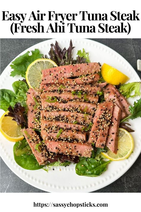 This air fryer tuna steak recipe is easy and perfect for busy weeknights. You can enjoy a delicious air-fried tuna steak meal in no time. How To Cook Tuna Steaks In Oven, Air Fryer Tuna Steak, Air Fryer Tuna, Fried Tuna, Tuna Steak Recipe, Ahi Tuna Steak Recipe, Ahi Tuna Steak, Tuna Steak Recipes, Tuna Steak