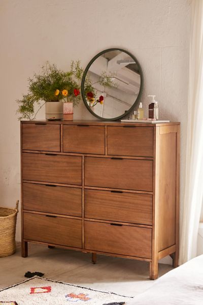 The sleekest way to maximize your storage space, this 9-drawer dresser has room for absolutely everything you want to store away. Featuring a trio of smaller drawers on the top row and 6 larger drawers, this dresser epitomizes a modern take on an industrial look. Features Sleek dresser from the Kira furniture collection 9-Drawers: 3 small drawers at the top with 6 larger drawers below Crafted from rubberwood with statement finishes Content + Care Rubberwood, Okume veneer, MDF Wipe clean Imported Vintage Living Room Furniture, Dress Idea, Vintage Living Room, Dresser Decor, Apartment Furniture, Apartment Inspiration, Boho Living Room, Room Inspiration Bedroom, My New Room