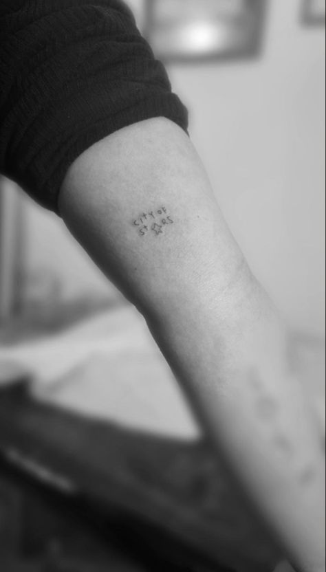 Fineline tattoo #fineline #tattoo #lalaland La La Land Inspired Tattoo, Right Here Right Now Tattoo, Lala Land Tattoo Ideas, City Of Stars Tattoo, La La Land Tattoo Ideas, La La Land Tattoo Minimalist, Lala Land Tattoo, Fangirl Tattoos, Landslide Tattoo