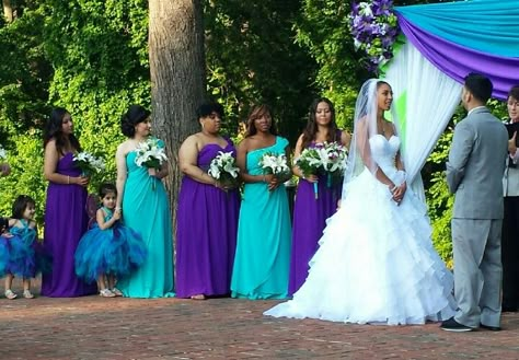 I like the way the bridesmaids are rotating between the two colors, possibly just have maid of honor and junior brides maids in purple everyone else in turquoise Purple Teal Wedding, Purple And Teal Wedding, Purple Turquoise Wedding, Purple And Blue Wedding, Turquoise Wedding Ideas, Blue Purple Wedding, Turquoise Bridesmaid Dresses, Galaxy Wedding, Peacock Wedding Theme