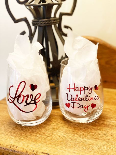 So, Valentine’s Day is quickly approaching, love is in the air and I’m in the mood to make some DIY Valentine wine glasses with the Cricut. I’m single so I don’t have anyone to celebrate with except my cats lol!! I do wish I had someone to celebrate with so I could decorate a beautiful table, but I guess I could still do that for myself. Valentine Glasses Ideas, Valentine’s Day Cricut Ideas, Valentine Wine Glasses, Wine Glasses Cheers, Valentine's Cricut Projects, Valentine Glasses, Glasses Valentine, Cricut Wine Glasses, Valentines Day Wine