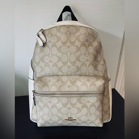 Beautiful Coach Signature Backpack- Used 1x! Practically Brand New!!! Signature Backpack With Smooth Cream Colored Leather Details. Inside Backpack Contains Zipper Pocket As Well As 2 Slip Pockets. Shoulder Straps Are Adjustable And Very Comfortable! Measurements Are As Follows: 10 3/4” (L) X 12 1/2” (H) X 4” (W) Colors: Im/Light Khaki/Chalk Does Not Come With A Dust Bag. Retails For: $428 (Last Picture Shows The Style/Size.) Designer Tote Backpack For Everyday Use, Designer Everyday Backpack Tote, Designer Everyday Tote Backpack, Coach Backpack Women, Designer Everyday Backpack With Removable Pouch, Luxury Beige Backpack With Adjustable Strap, Elegant Beige Travel Backpack, Classic Beige Backpack With Zipper Closure, Classic Beige Backpack Bag