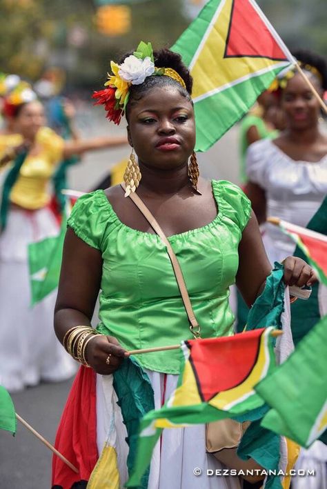 Proud Guyanese woman, Guyana flag. Guyana People, Guyana Women, Guyanese Women, Grenada Caribbean, Guyana Flag, Caribbean Outfits, British Guiana, Caribbean Culture, African Diaspora