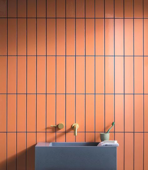 Orange Tile Bathroom, Blue Grout, Concrete Bathroom Sink, Tiled Bathroom, Mandarin Stone, Coloured Grout, Orange Bathroom, Orange Tiles, Orange Bathrooms