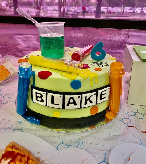 Nothing says science like a science birthday cake Science Beaker Cake, Science Birthday Party Cake, Mad Scientist Cake, Mad Science Birthday Cake, Science Themed Birthday Cake, Science Cakes Birthday Boys, Scientist Cake Ideas, Science Themed Cake, Science Cake Ideas