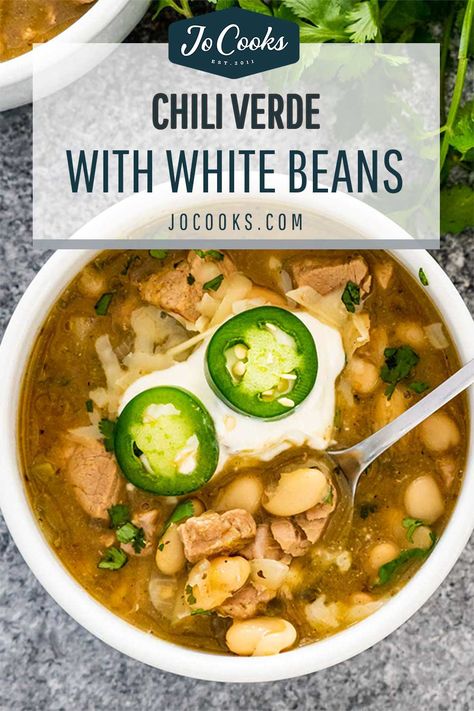 This Chili Verde with white beans and pork is a favorite and easy chili-style recipe. Pork tenderloin is slowly cooked with chilis, green enchilada sauce and many spices. A delicious Mexican-style dish! #chiliverde #pork #chili #recipe Pork Chili Verde Crock Pot Green Chile Stew, Pork Chili Verde Soup, Green Pork Chili Verde, White Pork Chili, Chili Verde Crockpot, Pork Chili Verde Recipe, Green Sauces, Pork Chili Verde, Meaty Chili