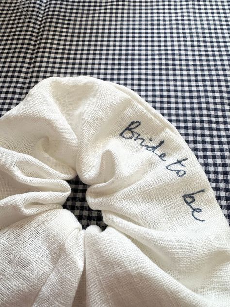 ---- Personalised Bridal Scrunchies ---- Perfect for Hen Dos, Pre wedding day celebrations, gifts for the Bride & even the big day itself!  All Scrunchies are handmade from a beautiful quality of ivory linen and embroidered with a personalised message of your choice! Get in touch if you have any questions!!  Visit our Shop to see the whole Bridal Range!  All Love Craft Do products are Designed and made by Mother & Daughter Duo Kim & Jasmine.  To follow our journey please follow us on instagram @ Hen Party Gifts For Bride, Hen Do Gifts For Hens, Future Bride Gifts, Bride Gifts Bachelorette Party, Pre Wedding Gift For Bride, Mother Of The Bride Wedding Gift, Diy Bridal Gifts, Best Bachelorette Gifts, Bachelorette Slogans