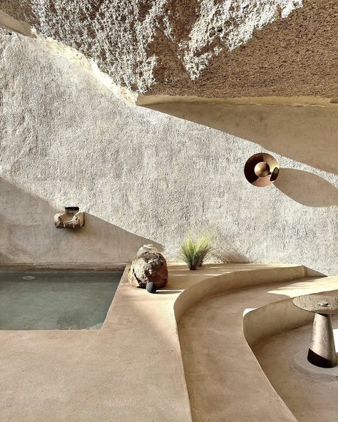 Underground Spa, Puglia Bathroom, Pool Underground, Golden Staircase, Indoor Pool Underground, Cave Like Architecture, Natural Interior Style, Cave Spa, Rock Arch