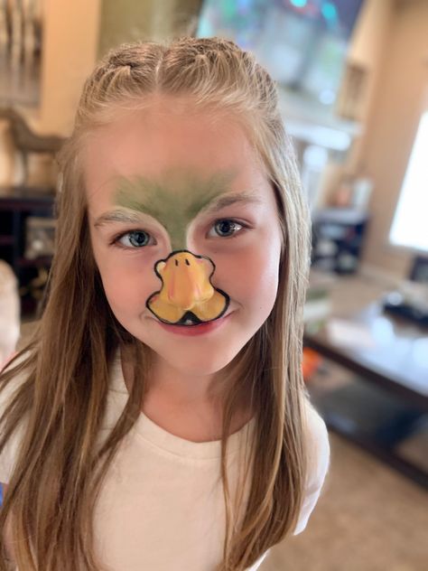 Duck face paint! 🦆🦆  Couldn’t find any duck makeup tutorials online so came up with this! Little duck beak face paint! Duck Makeup Halloween, Duck Face Paint, Hunting Face Paint, Duck Makeup, Shrek Makeup, Honk Jr, Face Painting For Kids, Shrek Costumes, Duck Beak