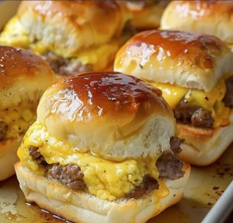 Sausage Egg and Cheese Breakfast Sliders     Ingredients     24 ounces ground pork sausage, 2 breakfast sausage rolls, like Jimmy Dean 12 Hawaiian buns, or other slider buns 8 large eggs, scrambled 6 slices pepper jack cheese 8 slices American cheese 1/2 cup butter, melted 1/4 cup maple syrup     Instructions     Preheat oven to 350°F. Warm large skillet over medium heat. Form sausage into 12 patties, slightly larger than one dinner roll. Add sausage to skillet and cook until completely ... Sausage Egg And Cheese Breakfast Sliders, Jimmy Dean Maple Sausage Recipes, Sausage Egg And Cheese Rolls, Hawaiian Roll Sliders Breakfast, Recipes With Maple Sausage, Hawaiian Roll Breakfast Sliders, Jimmy Dean Sausage Recipes, Chuck Steak Recipes, Sausage Sliders