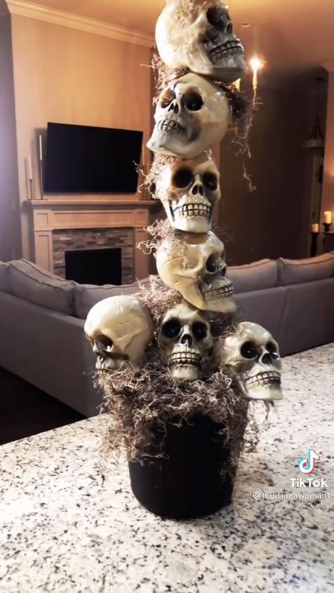 Dollar Tree Halloween Skull Decor, Stacked Skeleton Heads, Dollar Tree Skull Topiary, Dollar Tree Skull Crafts Diy, Dollar Store Skull Ideas, Dollar Tree Skulls, Skull Topiary Diy, Dollar Tree Skull Diy, Dollar Tree Skull Crafts