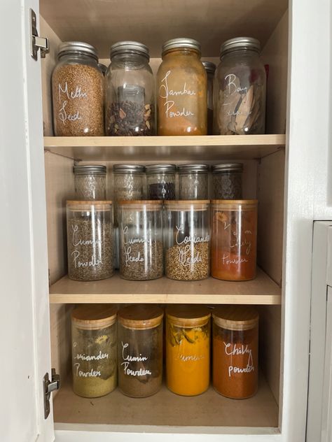 Indian spice organization Spice Cabinet Organization, Spice Cabinet, Indian Kitchen, Spice Organization, Kitchen Cabinet Organization, Indian Spices, Cabinet Organization, Spice Jars, Pantry Organization