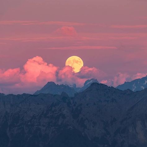 A full moon rises over the Swiss Alps  Photo by @antongalitch Celestial Wedding Theme, Alps Switzerland, Full Moon Rising, Dawn And Dusk, Pretty Backgrounds, Moon Rise, Swiss Alps, July 10, Moon Art