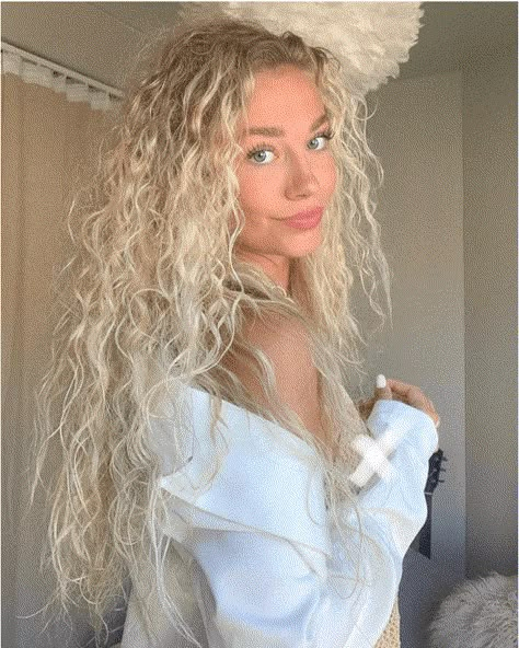 The Ultimate Guide to Naturally Curly Hair - Society19 Ice Blonde Curly Hair, Icy Blonde Curly Hair, Wavy Platinum Blonde Hair, White Blonde Curly Hair, Phoenix Hair, Blonde Wavy Hair, Blonde Curly Hair, Blonde Curls, Boring Hair