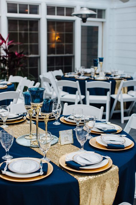 Navy Blue White Gold Wedding, Navy Blue Wedding Ideas Decor, Classic Blue And Gold Wedding, Dark Navy Blue And Gold Wedding, Dark Blue Gold And White Wedding, Wedding Centerpieces Blue And Gold, Cobalt Blue And Gold Wedding, Navy Blue And Gold 70th Birthday Party, Navy Blue Table Cloth With Gold Runner