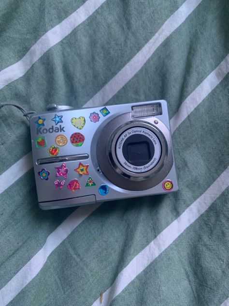 #camera #kodak #stickers Decorated Camera, 2008 Aesthetic, 2007 Aesthetic, Digi Camera, 80s Clothes, Camera Life, Camera Decor, Camera Keychain, Kodak Camera