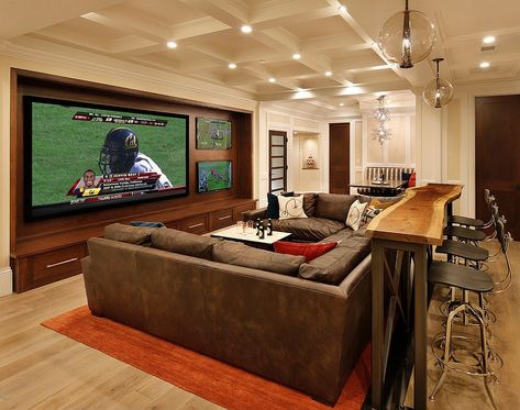 Glorious Game Nights: Best Sports-Themed Media Rooms and Home Theaters U Couch, Sala Cinema, Ruang Tv, Bilik Permainan, Behind Couch, Man Cave Basement, Home Cinema, Basement Design, Entertainment Room