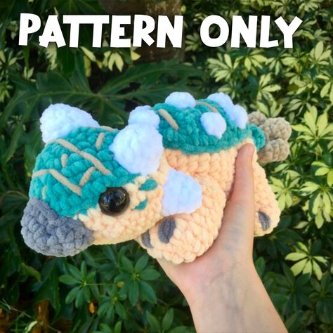 This is NOT A PHYSICAL PLUSH! This product is a crochet pattern to make your very own adorable Ankylosaurus plush inspired by Jurassic world: camp cretaceous!  skill level: (for both crocheting the plush and sewing the pieces together)  intermediate  This pattern is written in American terminology and is only available in English.  Pattern skill requirements: To make this pattern you will need to know how to read a crochet pattern and have a basic knowledge of crochet stitches like single croche Crochet Big Animals Free Patterns, Crochet Lilo And Stitch Pattern Free, Crochet Godzilla, Free Elephant Crochet Pattern, Dinosaur Crochet Pattern, Plush Yarn Crochet Patterns, Written Crochet Patterns, Crochet Ankylosaurus, Free Crochet Plushie Patterns Dinosaur