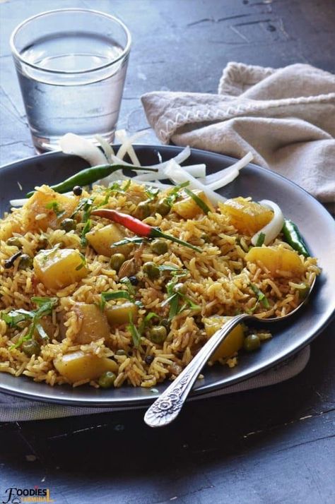 Aloo Matar Pulao aka Indian style Potato peas rice dish that's cooked under 30 mins in the Instant Pot. Make this easy peas rice recipe for potlucks, picnics, parties, lunch or dinner. It's gluten free & can be made vegan. A great one pot rice dish that's cooked with peas & potatoes. #aloomatarpulao #matarpulao #aloopulao #pulao #ricepilaf #indianpulaovegetarian #peasrice #glutenfree #vegetarian #instantpotmatarpulao #instantpotpeaspulao #peas #aloo #foodiesterminal Peas Pulao Recipe, Vegetarian Rice Dishes, Peas Pulao, Pulao Rice, Peas Rice, Healthy One Pot Meals, Pilaf Recipes, Trini Food, Aloo Gobi