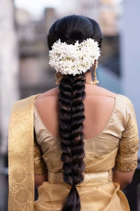 Introducing latest Bridal Hairstyles for South Indian Brides. #weddingbazaar #indianwedding #bridalhairstyle #southindianweddings #southindianbride #southindianhairstyleforsaree #southindianhairstylesimple #southindianhairstylebridal #southindianhairstyletraditional #southindianhairstylelehenga Mallige Flowers Hairstyle, Messy Braid With Jasmine Flowers, Braided Hairstyles With Jasmine Flowers, Jasmin Flower Hairstyle Kerala, Braid With Jasmine Flowers, Jasmine Hairstyles Indian, Jasmine Flower Hairstyle, Jada Hairstyles, Priyanka Wedding