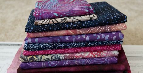 Don't Cut Those Batiks Before You Do This - Quilting Digest Quilts Made With Batik Fabric, Purple Prints, Purple Couch, Quilt Techniques, Quilting Digest, Fabric Outlet, Quilt Tips, Batik Quilts, Dye Colors