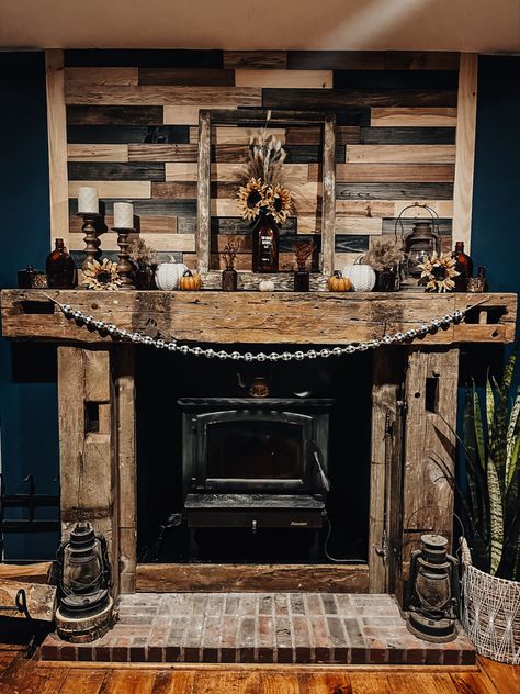 3D wood stained reclaimed wood with barn wood beams.  Fall Decor.  Farmhouse mantle Fireplace Mantle Decor Western, Small Fake Fireplace Ideas, Pallet Stove Ideas, Rustic Wood Fireplace Surround, Cabin Mantle Decor Rustic, Rustic Gas Fireplace Ideas, Reclaimed Wood Fireplace Surround, Western Fireplace Decor, Rustic Wood Stove Surround