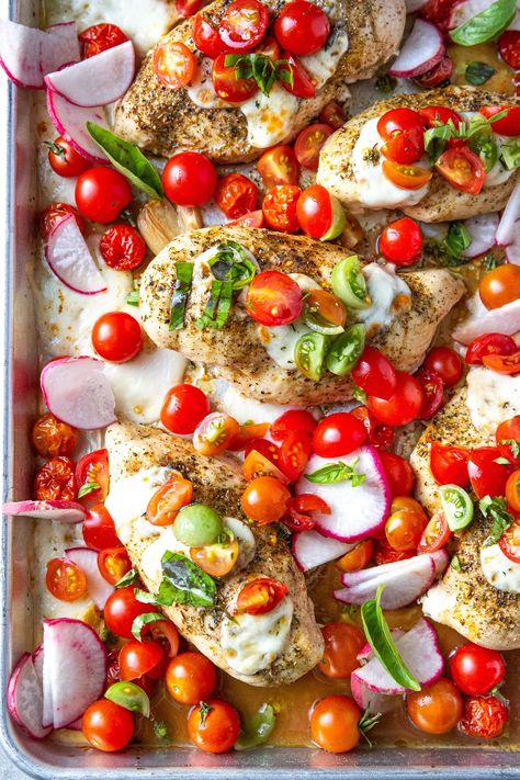 Sheet Pan Bruschetta Chicken, perfectly baked chicken breasts topped with mozzarella cheese, cherry tomatoes, fresh basil and flavorful oil and balsamic vinegar dressing. #sheetpanchickenrecipe #sheetpandinner #chickenrecipe #chickenbruschetta Chicken Bruschetta Recipe, Balsamic Vinegar Dressing, Tomato Mozzarella Basil, Delicious Chicken Recipes, Baked Chicken Breasts, Sheet Pan Meals Chicken, Bruschetta Chicken, Mozzarella Chicken, Vinegar Dressing