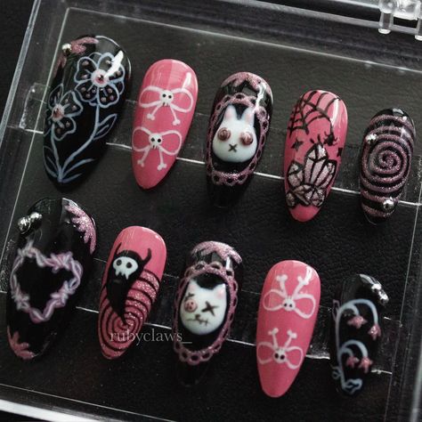 creepy cute set 💀🎀 first halloween set, heavily inspired by @starlightnail_s !! thirteen year old me would’ve DIED for these nails when i was a little scene bean 😅 ——————————— ngl coming up w a halloween theme that hasnt been done yet was kinda hard but we managed 🎃 any former emo’s out there who know ghost town? ——————————— #halloweennails #fallnails #creepycute #gelnails #nailart #spookynails #nailinspo Scary Nail Ideas, Goth Kawaii Nails, October Nail Designs Short, Coquette Halloween Nails, Emo Halloween Nails, Creepy Cute Nails, Gloomy Nails, Sanrio Halloween Nails, Creepy Nail Designs