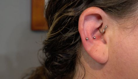 The snug piercing is a rather unique body piercing. Read our blog today to learn about aftercare tips and tricks. Snug Piercing Ideas, Piercings Jewelry, Snug Piercing, Ear Tapers, Gold Body Jewellery, Piercing Aftercare, Labret Piercing, Piercings Unique, Eyebrow Piercing