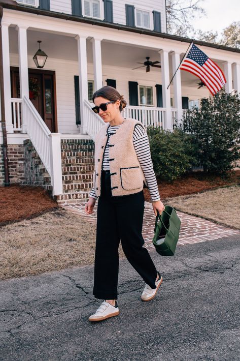 Liz Adams shares twelve wardrobe essentials for classic style in 2023, including the best striped shirt, white sneakers, leather tote bag, and more. Classic Cardigan, Striped Long Sleeve Shirt, Classic Dress, Striped Tee, Light Jacket, Daily Look, White Sneakers, Striped Shirt, Get Dressed