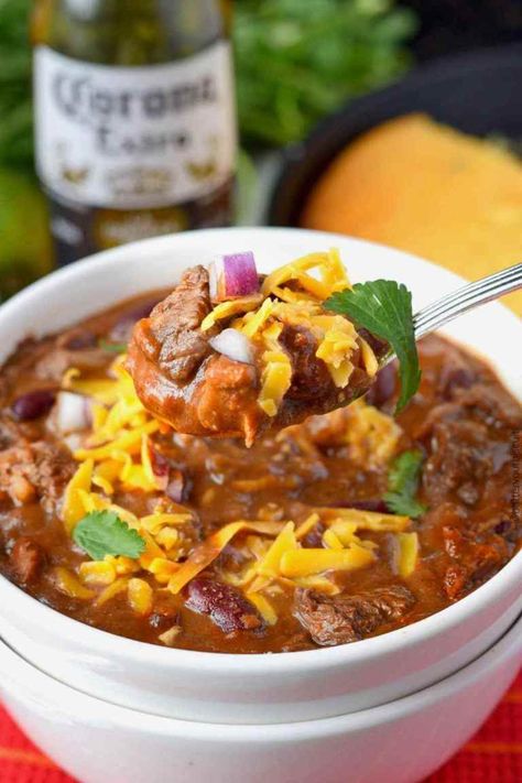 Ribeye steak chili in a white bowl with a spoon Best Steak Chili Recipe, Dutch Oven Chili Recipe, Steak Chili Recipe, Chili Recipe Video, Steak Chili, Steak Soup, Beef Chili Recipe, Leftover Steak, Bean Chili Recipe