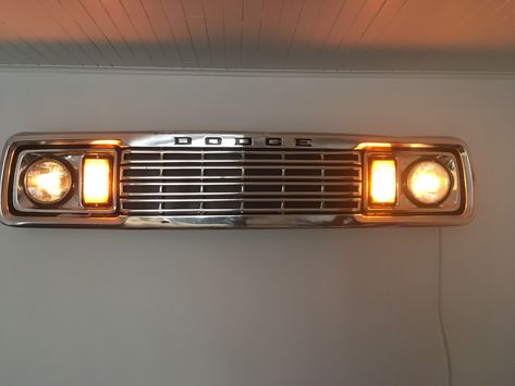 Dodge Ramcharger grill wall art lights Car Grill Wall Art, Hubcap Wall Decor, Automotive Wall Art, Grill Wall, Nyc Studio Apartments, Cool Bedrooms For Boys, Garage Furniture, Western Rooms, Dodge Ramcharger