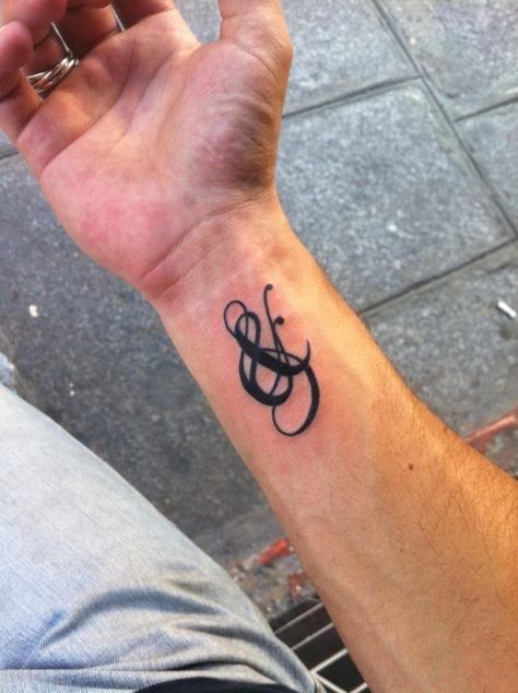 21 Creative and Symbolic Ampersand Tattoos and Meanings - Tattoos Win Ampersand Tattoo, Heart With Infinity Tattoo, Mayan Tattoos, Cool Wrist Tattoos, Dandelion Tattoo, Semicolon Tattoo, Wrist Tattoos For Guys, Medusa Tattoo, Mermaid Tattoos