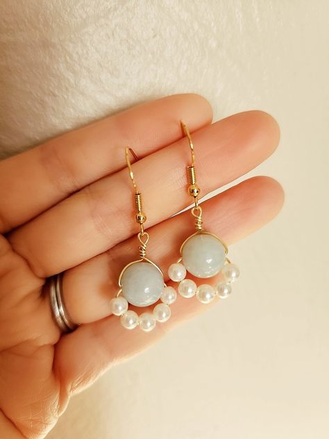 These Jade dangle earrings/White jade and pearl earrings/White jade earrings/Chinese jewelry/Jadeite earrings are so cute to wear. They are carefully handmade with high-quality white jade beads (10mmm) and swarovski pearls (4mm).  The earrings are approximately 1.5 inches long. They are very everyday, and can go with any tops, especially if you want to add an oriental taste to your outfit.  If you like jade/jadeite, I also have other jadeite pieces and you're welcome to take a look at them in th Elegant White Jade Earrings, White Jade Dangle Jewelry, Jade Round Earrings For Wedding, Round Jade Earrings For Wedding, Elegant Round Jade Earrings For Weddings, White Jade Earrings For Gift, Jade Pearl Drop Earrings As Gift, Passion Work, Diy Wire Earrings