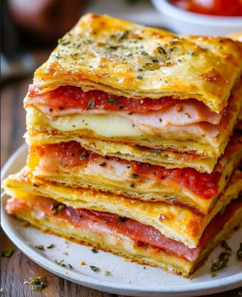 This Squared Antipasto is a delightful twist on traditional antipasto platters, combining layers of savory meats, cheeses, and roasted red peppers all encased in flaky crescent roll dough. Perfect for parties, gatherings, or a cozy family dinner, this dish is both visually appealing and bursting with flavor. With the added richness of a pesto and […] Artichoke Crescent Roll Appetizer, Turkey Shaped Antipasto, Baked Antipasto Squares, Italian Sub Squares With Crescent Rolls, Stromboli With Crescent Rolls, Crescent Roll Italian Bake, Antipasto Squares Crescent Rolls, Antipasto Sandwiches, Mozzarella Roll Ups