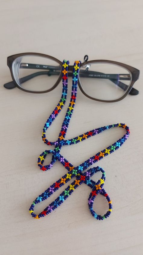 "You can always wear it easily.  You can use it not only as eyeglass chain, but also as a necklace and bracelet with rainbow colors.  Measures approx. 28\" (71 cm) total length Rainbow sunglasses necklace will be a perfect gift for yourself and your loved ones.  The price is for 1 piece of eyeglass necklace with black background. I can make it in any color you want. Please contact me. Thank you for visiting my store." Pride Sunglasses, Eyeglasses Lanyard, Boho Glasses, Beaded Glasses, Glasses Necklace, Rainbow Sunglasses, Diy Jewelry Making Tutorials, Sunglasses Necklace, Eyeglass Necklace