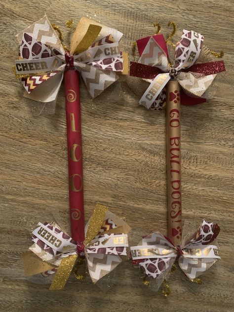 Maroon and Gold Bulldogs spirit sticks cheerleading Spirit Sticks Cheerleading, Cheerleading Diy, Cheer Spirit Sticks, How To Make Mums, Big Homecoming Mums, Unique Homecoming Mums, Spirit Stick, Homecoming Mums Senior, Spirit Sticks