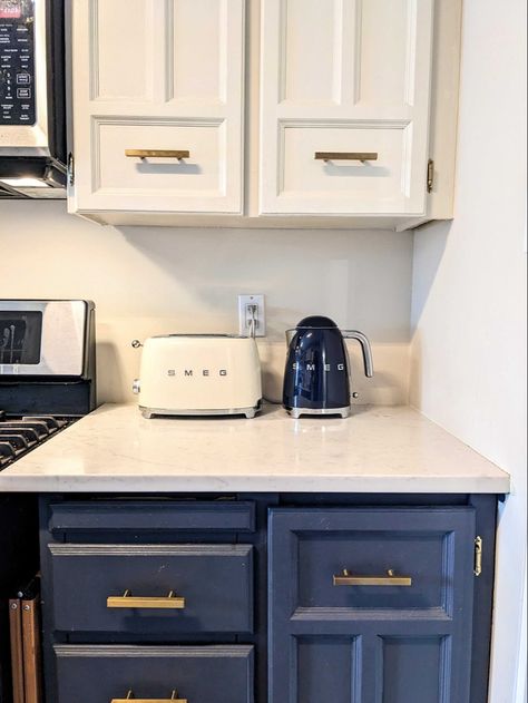 Smeg toaster and kettle set to match the kitchen colour scheme. Cream and Navy blue <3 Blue Kitchen Aesthetic Vintage, Navy Blue Kitchen Aesthetic, Navy Kitchen Appliances, Navy Blue Kitchen Appliances, Blue Smeg Kitchen, Smeg Kettle In Kitchen, Navy Blue And Cream Kitchen, Smeg Toaster In Kitchen, Navy And Cream Kitchen