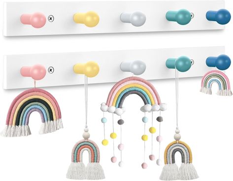 Transform your little one's room into a magical, organized haven with our Kids Coat Rack Wall Mount Rainbow! 🌈✨ Watch as their face lights up with joy each day they step into their enchanted space. 💫 Say goodbye to clutter and hello to endless smiles! Get yours now. 🦄🌟 #KidsDecor #RoomMakeover #MagicalRainbow #OrganizedSpace #ParentingWins #KidApproved #UnicornDreams #RenterFriendly #CozyCorner #HappyHearts #ShopNow Hooks In Bedroom, Kids Coat Hooks, Backpack Hooks, Kids Coat Rack, Kids Wall Hooks, Coat Rack Wall Mount, Wooden Coat Hooks, Pastel Walls, Hanger Wall