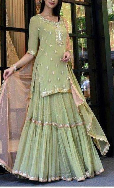 Excited to share this item from my #etsy shop: Pista green embroidered kurta with flared georgette mehendi lehenga and contrast peach embroidery dupatta. #embroidered #green #pink #fordiwali #bridesmaidslehenga #weddinglehenga #lehenga Modern Sharara, Sharara Kurti, Kurti Designs For Women, Latest Traditional Dresses, Maharani Designer Boutique, Designer Bridal Lehenga Choli, Pista Green, Indian Lehenga Choli, Punjabi Fashion