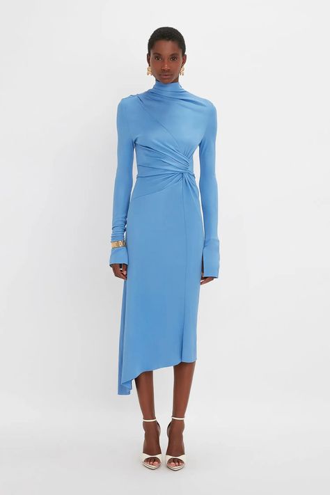 Experience luxury and sophistication with our Victoria Beckham asymmetric draped midi dress. Handmade by a high-end designer, this dress boasts a beautiful blue color and is crafted with the finest silk. Elevate your style with this stunning piece that exudes elegance and grace. Draped Midi Dress, Draped Midi Dresses, Oxford Blue, Sophisticated Dress, Mini Dress Casual, Draped Dress, Shop Maxi Dresses, Seville, Chain Earrings