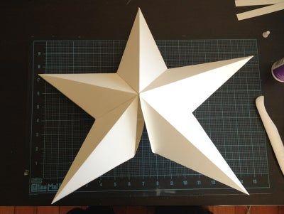 Paper Gold Star Tree Topper : 7 Steps (with Pictures) - Instructables Gold Star Tree Topper, Origami Tree, Cardboard Tree, Diy Tree Topper, Sheet Music Crafts, Christmas Tree Star Topper, Toppers Diy, Diy Christmas Tree Topper, Folding Paper